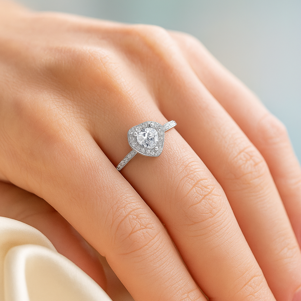 Pear Shaped Halo Ring with Sparkling Accents