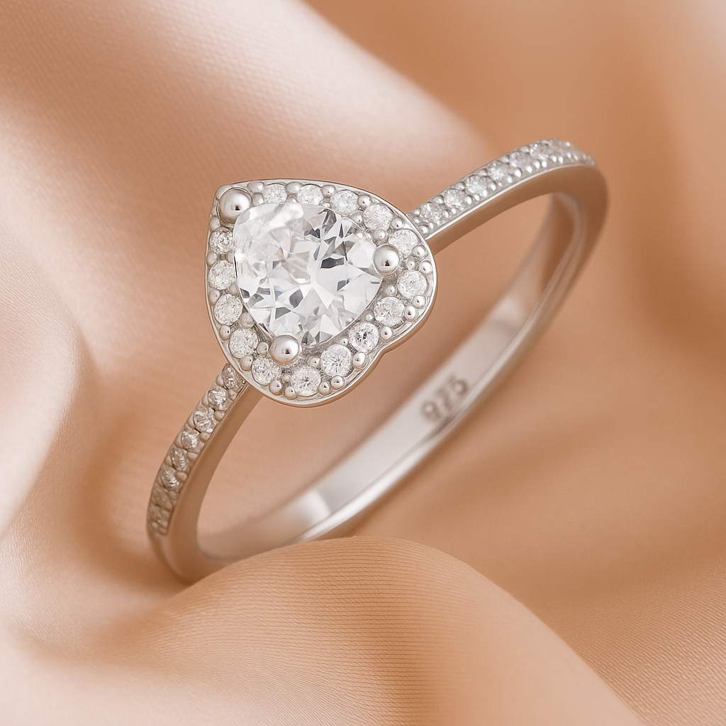 Pear Shaped Halo Ring with Sparkling Accents