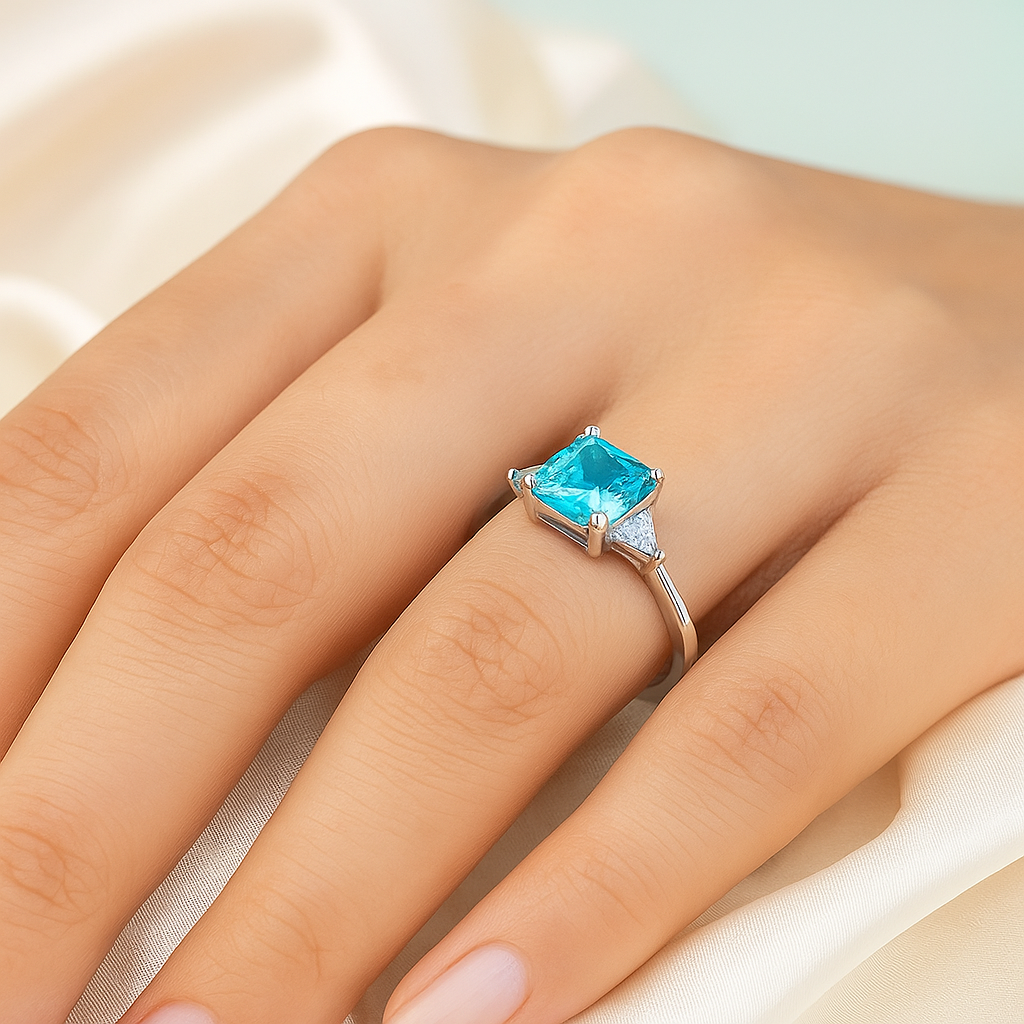 Blue Princess Cut Ring with Sparkling Side Stones