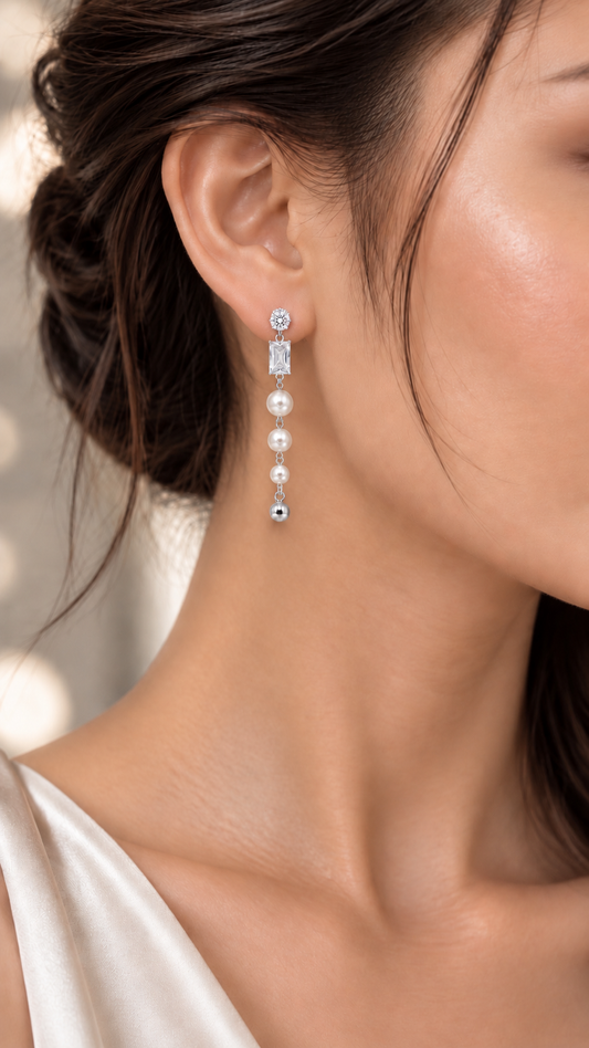 Graduated Pearl Long Drop Earrings