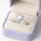 Pear Shaped Halo Ring with Sparkling Accents