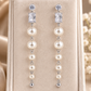 Graduated Pearl Long Drop Earrings