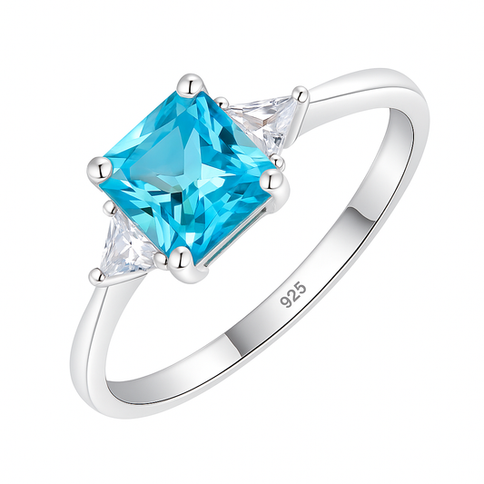 Blue Princess Cut Ring with Sparkling Side Stones