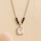 925 Silver Accented Pendant with Royal Emerald-Cut Crystal – Modern Luxe Statement Necklace