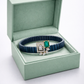 Premium Blue Enamel Stretch Bracelet with Emerald Cut Green Gem & Diamond Finish