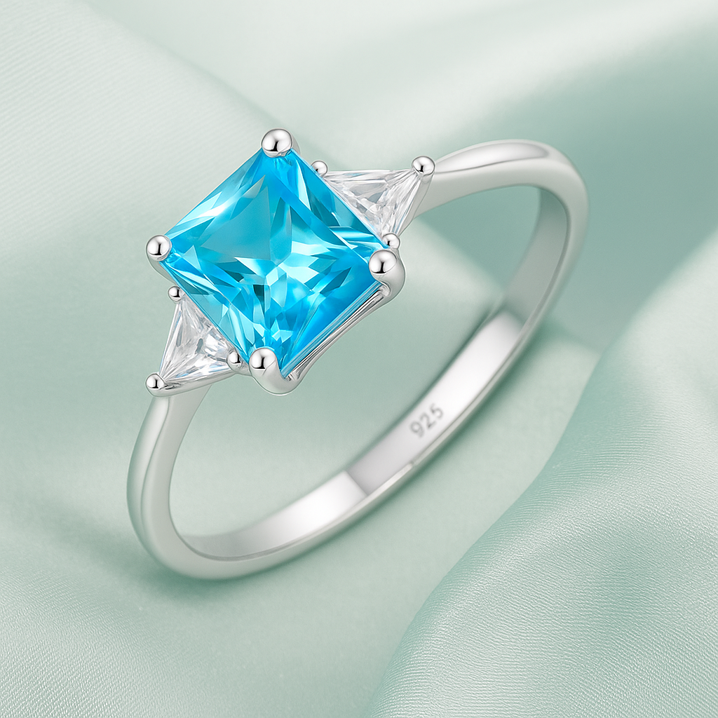 Blue Princess Cut Ring with Sparkling Side Stones