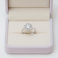 Classic Halo Round Solitaire Ring with Side Twist