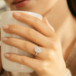 Charming Pink Oval Solitaire Ring with Side Accents