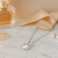 925 Silver Bow Halo Pendant Necklace for Women – Elegant Round CZ Solitaire with Twin Triangle Design