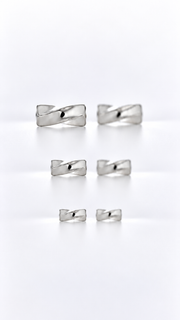 Polished Crisscross Ribbon Stud Earrings Set – 3 Sizes - Aaryahi Silver jewellery product photo