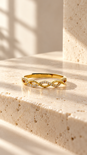 Gold CZ Infinity Twist Ring